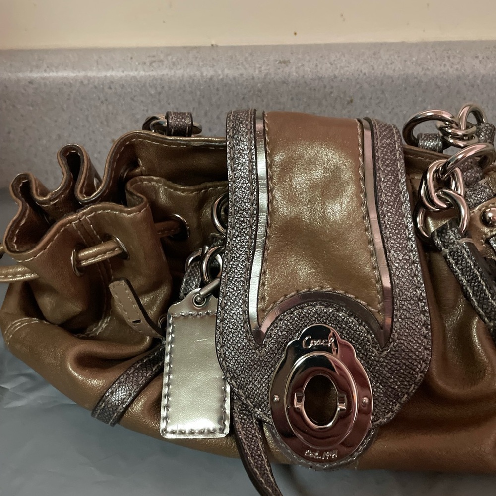 Coach Metallic Brown hand Bag.